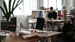 small payroll business office with staff working